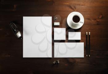 Photo of blank corporate stationery set on wooden background. Template for branding identity. Branding mock up. Flat lay.
