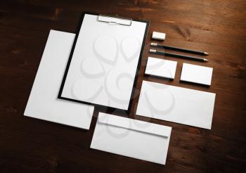 Blank stationery set on wood table background. ID template. Mockup for branding identity for designers.