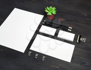 Blank stationery and ID template on wooden background. Mock-up for branding identity for designers.