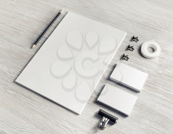 Stationery mock up. Blank corporate identity template on light wood table background. Responsive design mockup.