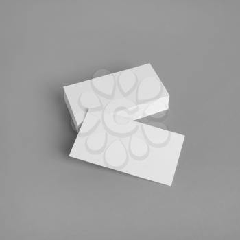 Photo of blank business cards on gray background. Template for ID.