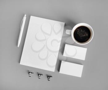 Blank corporate stationery set on gray paper background. Template for branding identity. Top view. Flat lay.