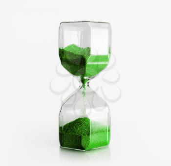 Hourglass with green filler on light background. Time concept.