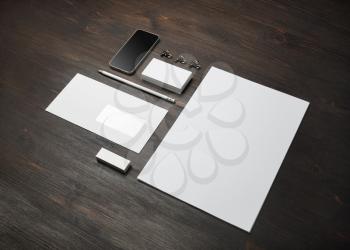 Blank branding identity set on wooden background. Corporate stationery template. For design presentations and portfolios.