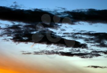 Horizontal vibrant dramatic sunset cloudscape background backdrop