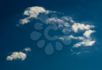 Horizontal dramatic bright day cloudscape background backdrop