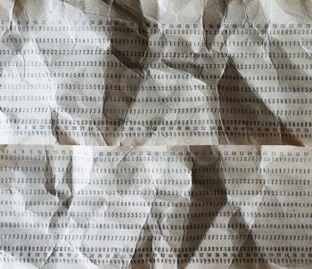 Horizontal crumpled punched cards background