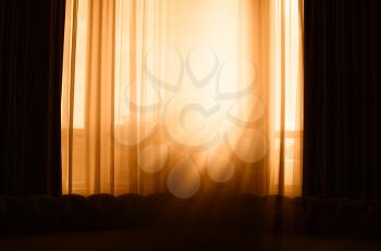 Vertical window curtains with dramatic light leak background hd