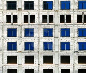 Symmetric windows at construction site background hd