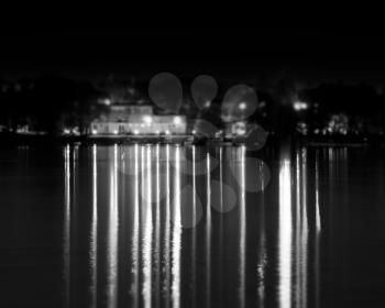 Black and white reflections of river night illumination backdrop