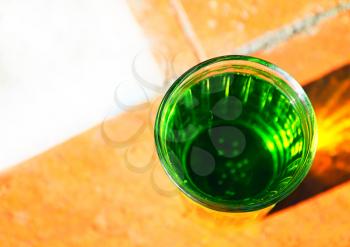 Glass of green acid soda object background