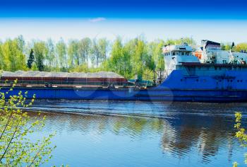 Industrial ship transporting different goods background