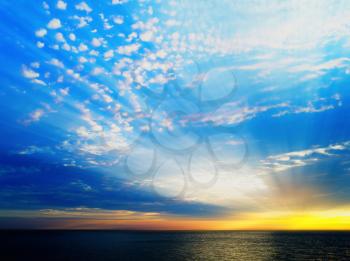 Dramatic light rays over the ocean surface backdrop hd