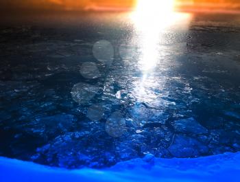 Dramatic ice on river surface with stunning light leak background hd