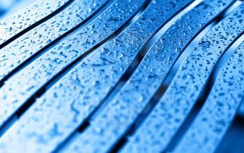 Diagonal blue bench with rain drops background hd