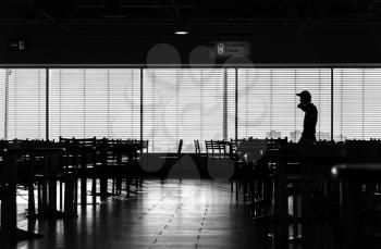 Walking man in airport cafe silhouette hd