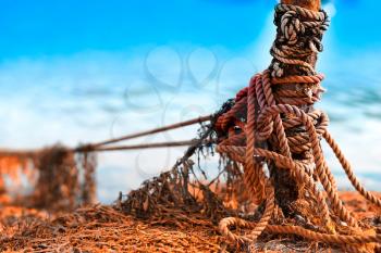 Tied up ship rope on Norway beach hd