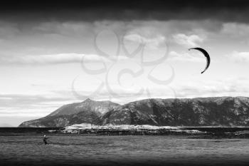 Kite flyer in sea black and white background hd