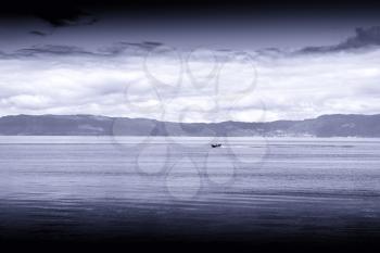 Blue sepia boat in Norway sea landscape background hd