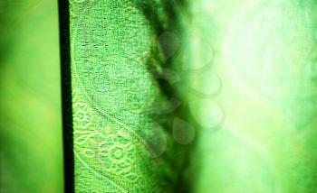 Horizontal vivid green curtain bokeh background