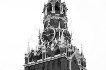 Black and white Moscow Kremlin tower with clocks closeup background
