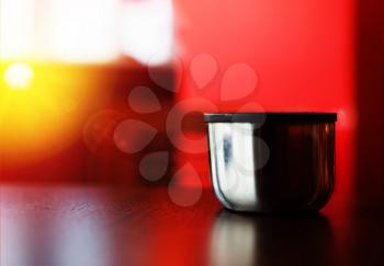 Horizontal cup of hot tea bokeh background
