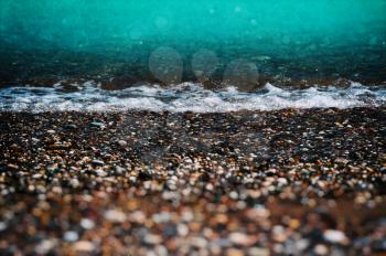 Aqua tidal beach pebble shingle vintage film composition