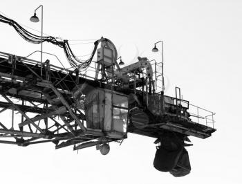 Horizontal black and white industrial machinery crane closeup background backdrop