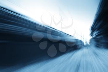 Diagonal blue train motion blur background