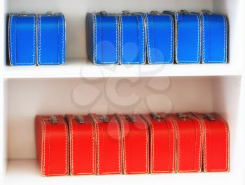 Blue and red toy cases on the shelf background hd
