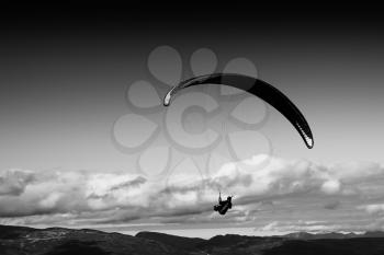 Black and white kite flyer in the sky background hd