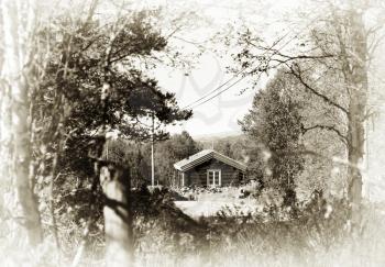 Norway distant farm house in woods sepia background hd