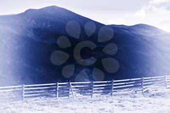 Norway fence in mountains blue sepia background hd