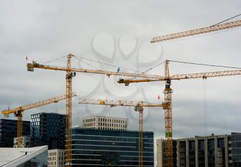 Industrial cranes building Oslo downtown background hd