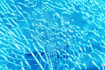 Horizontal broken pale blue ice glass textured backdrop