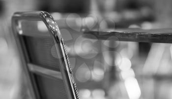 Horizontal empty cafe table with chair bokeh background