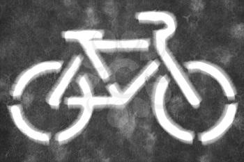 Black and white bicycle symbol on blurred background