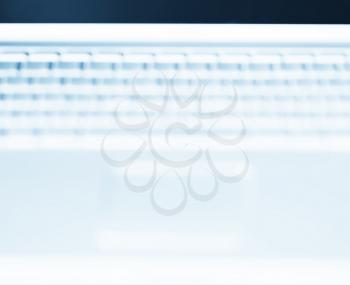 Horizontal laptop keyboard bokeh background
