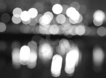 Black and white night city lights bokeh with reflections background hd