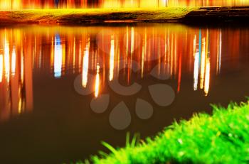 Colorful lights reflections on lake surface background hd