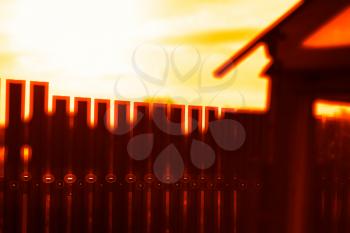 Vertical sunset fence bokeh background hd