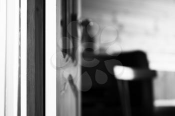 Vertical black and white opened door bokeh background hd