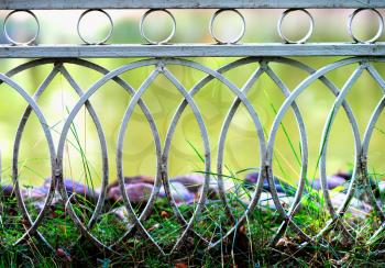 Curved park fence bokeh background hd