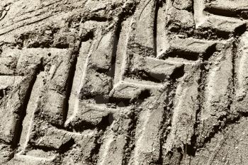 Diagonal tire footprint in dirt texture background hd