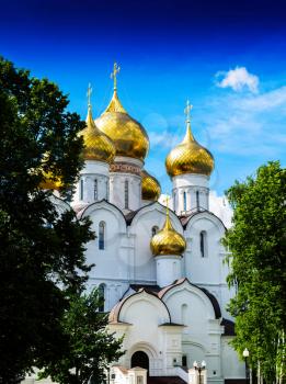 Vertical vibrant vivid Russian orthodox church temple