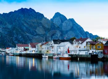 Horizontal vivid Norway town mountain pier reflections lights background backdrop