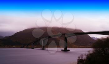 Horizontal slim Norway bridge overcasted landscape background