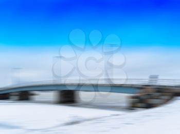 Horizontal vivid vibrant blue bridge with lamps motion abstraction landscape background backdrop