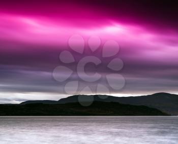 Horizontal vivid pink Norway fjord mountain bay landscape background backdrop
