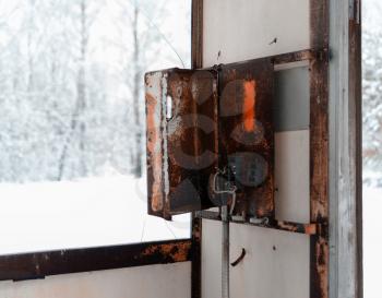 Horizontal rusty cyberpunk public call-box winter bokeh background backdrop